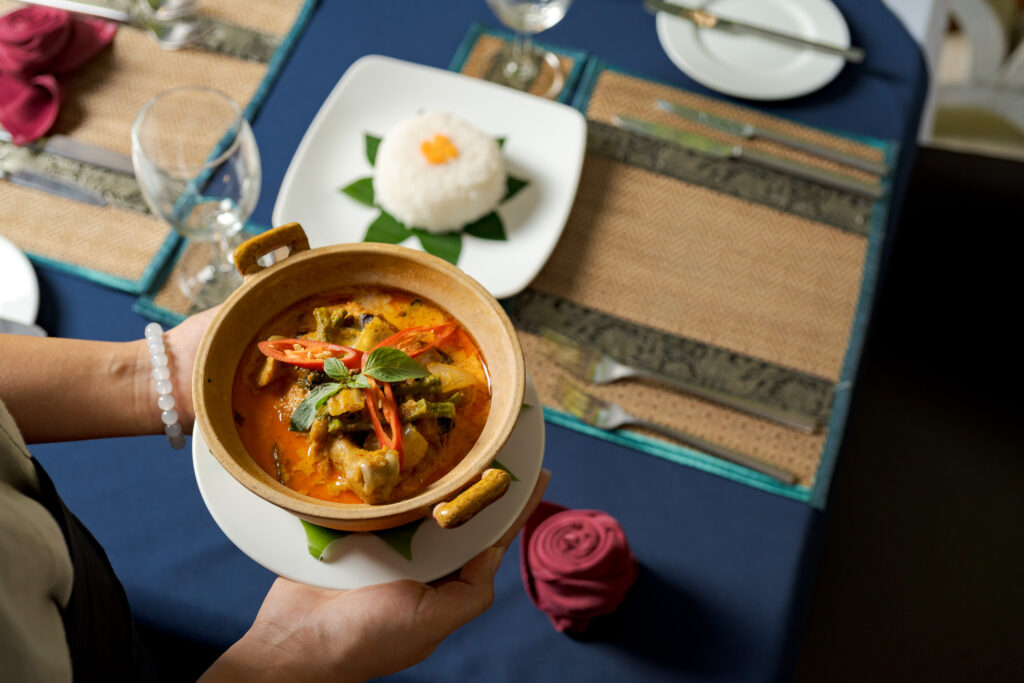 Traditional Cambodian curry with steamed rice served at Areca Restaurant, La Rivière d’Angkor Siem Reap